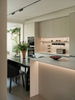 Modern - style Open - plan Kitchen - Dining Area with Spacious, White cabinets and log - colored cabinets