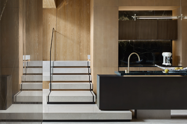 A sideboard in modern style is equipped with minimalist light - wood cabinets